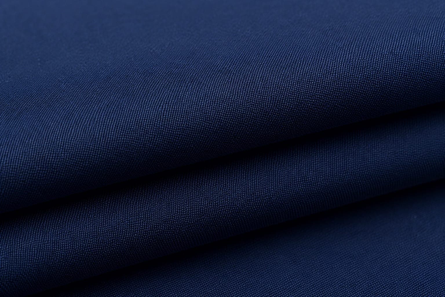 Navy fine weave trouser fabric close-up