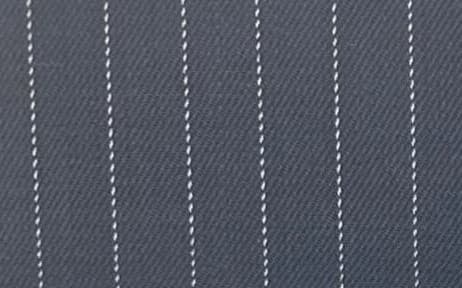 Rolls of uniform suiting fabric in a mill