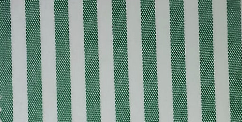 Close-up of green and white striped hospital bed sheet fabric